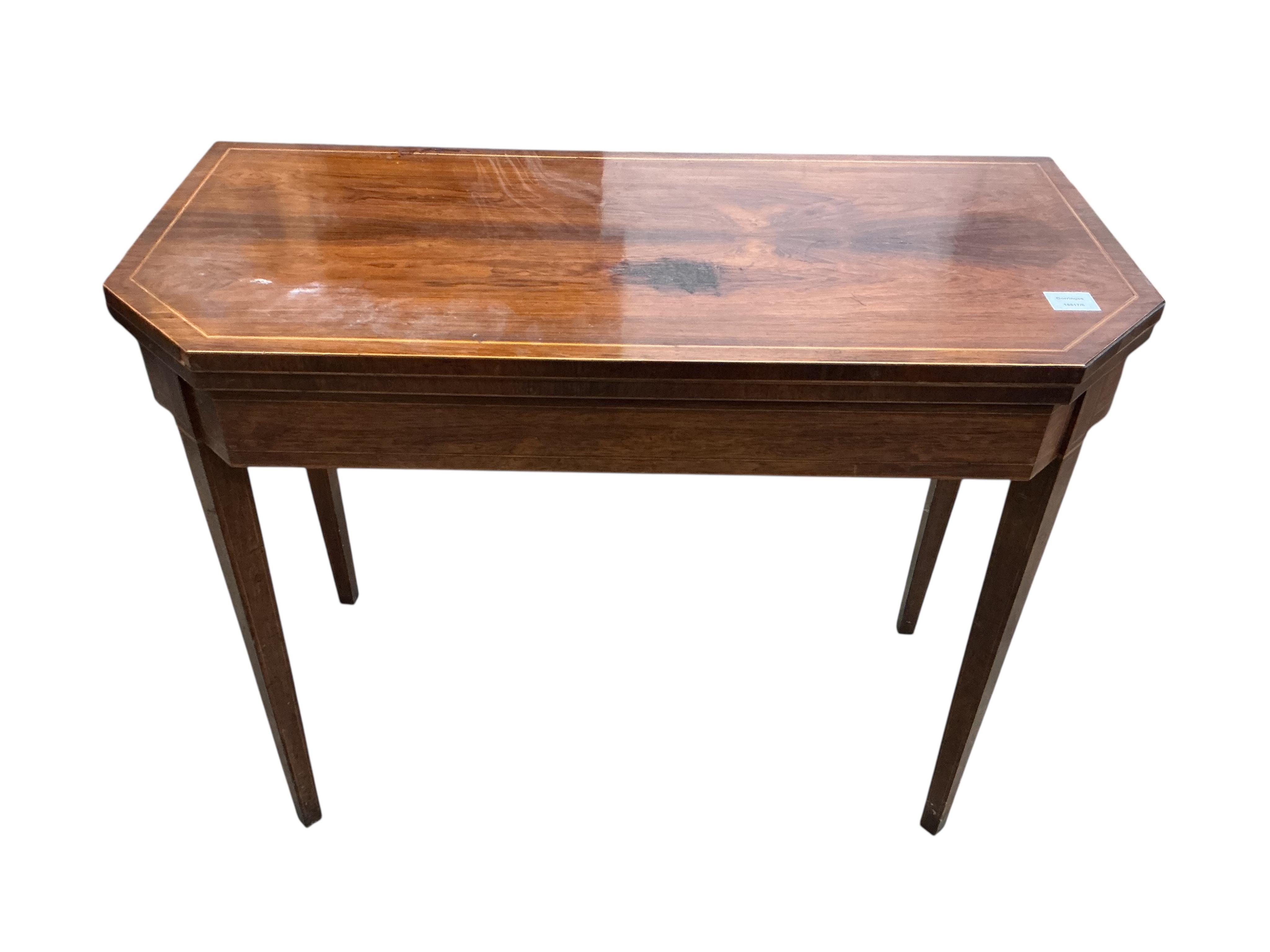 A George III inlaid banded rosewood folding tea table, width 91cm, depth 43cm, height 74cm